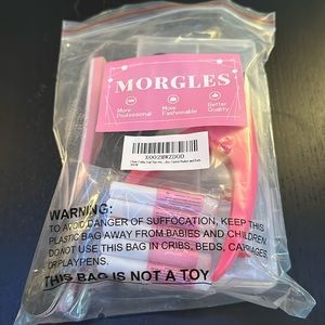 Nails with glue and tools to shape